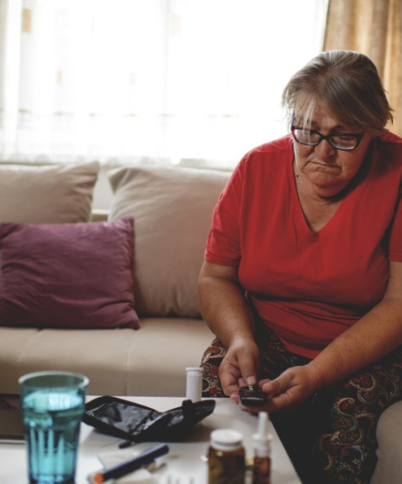 Diabetes patient at home with their medication