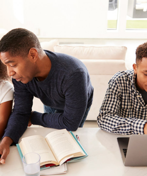 parents working with kids on homework