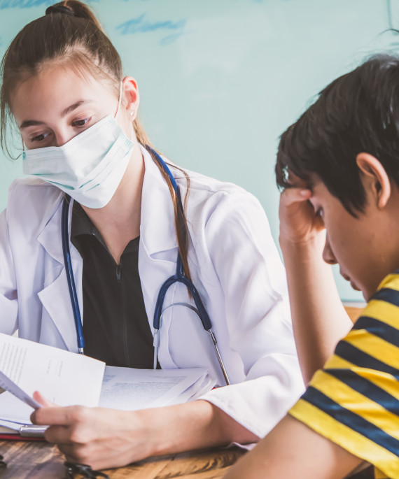 female doctor talking to patient
