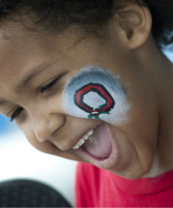 young child with osu face paint