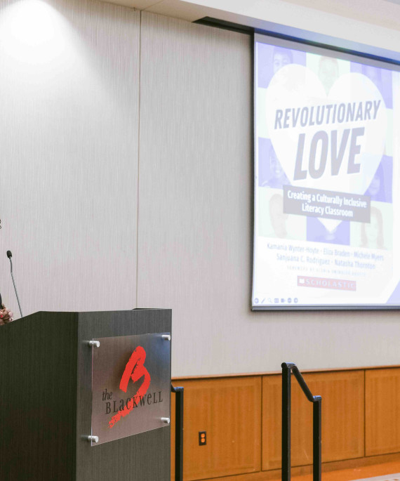 Speaker at Higher Ground Symposium