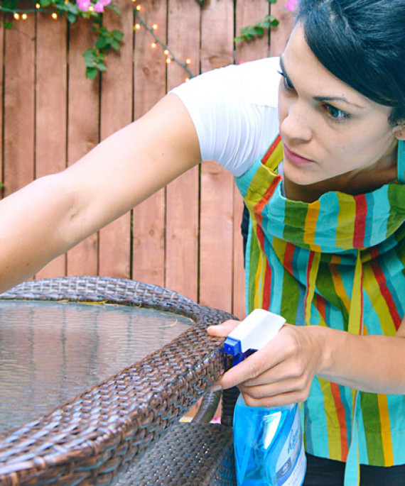 mother using cleaning spray