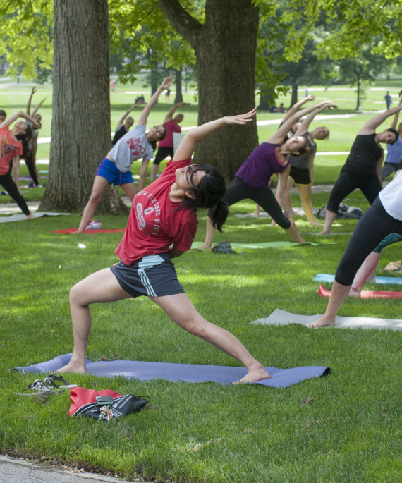 Ohio State students doing Yoga outside on campus