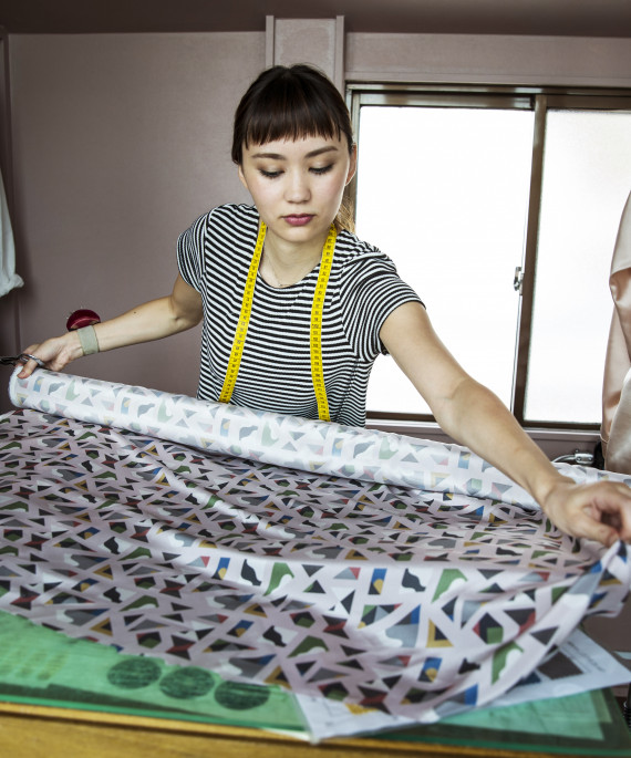 japanese-female-fashion-designer-working-in-her-studio