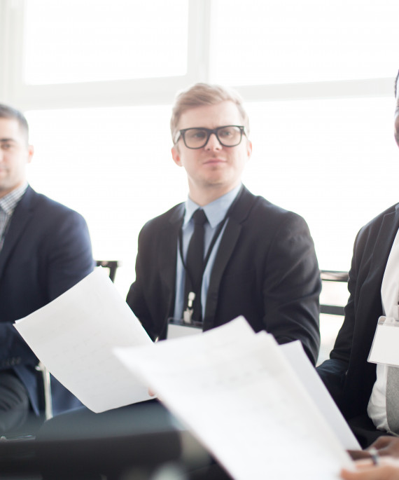 businesmen presenting a report