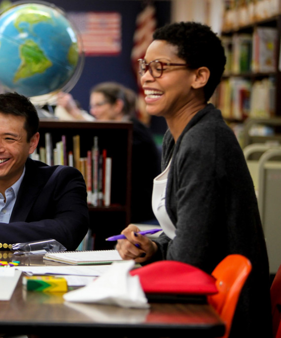 Chao in classroom with two students