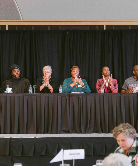 Newbery Symposium authors on stage during the event