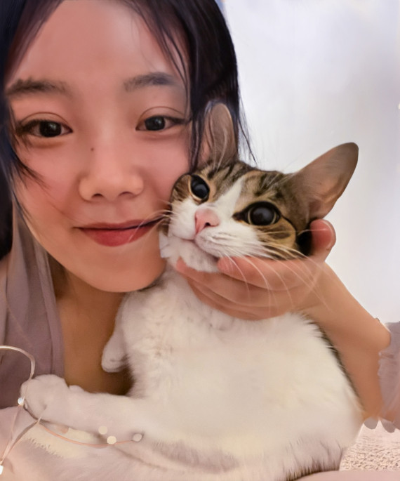 Woman holding her pet cat