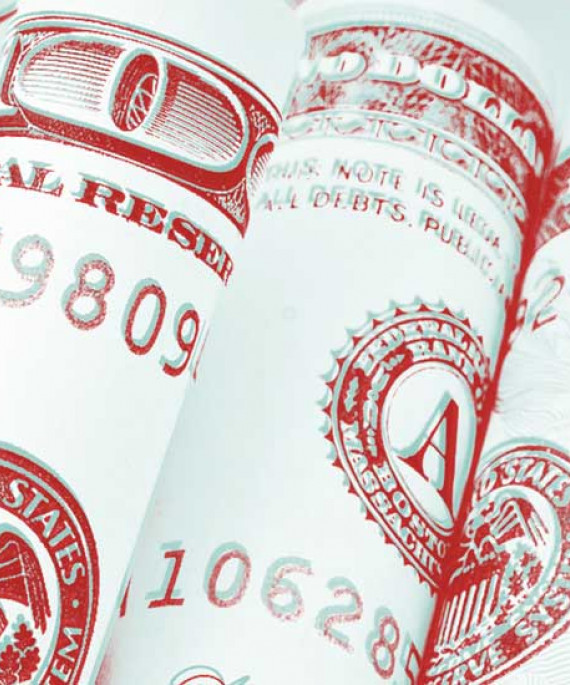 scholarship money, several rolled banknotes