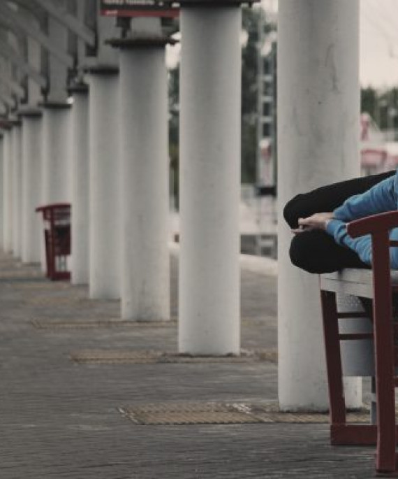 homeless youth on bench