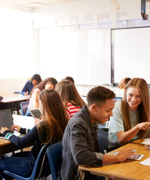 Highschool classroom with students working at their desks
