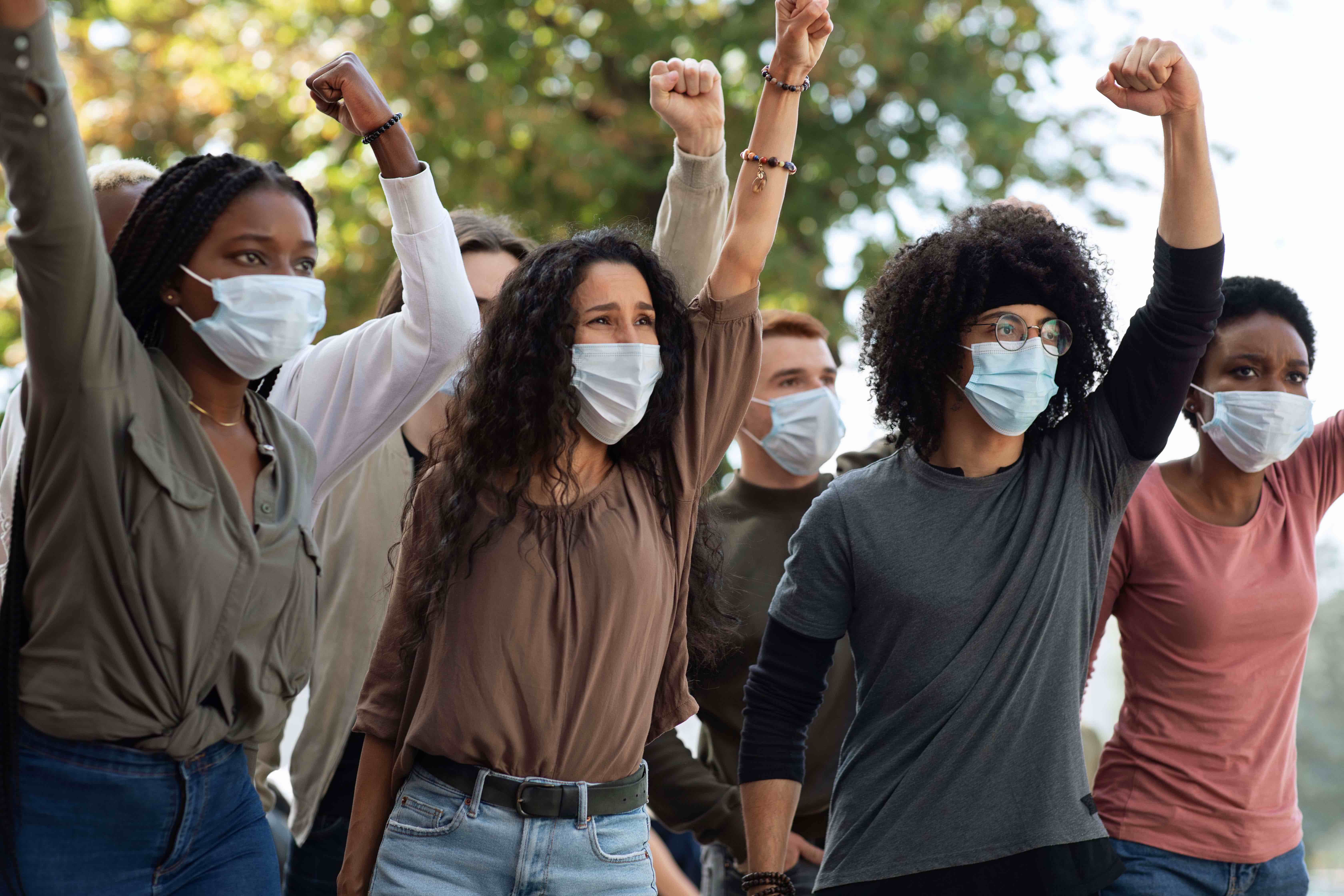 College students in facemasks at a protest