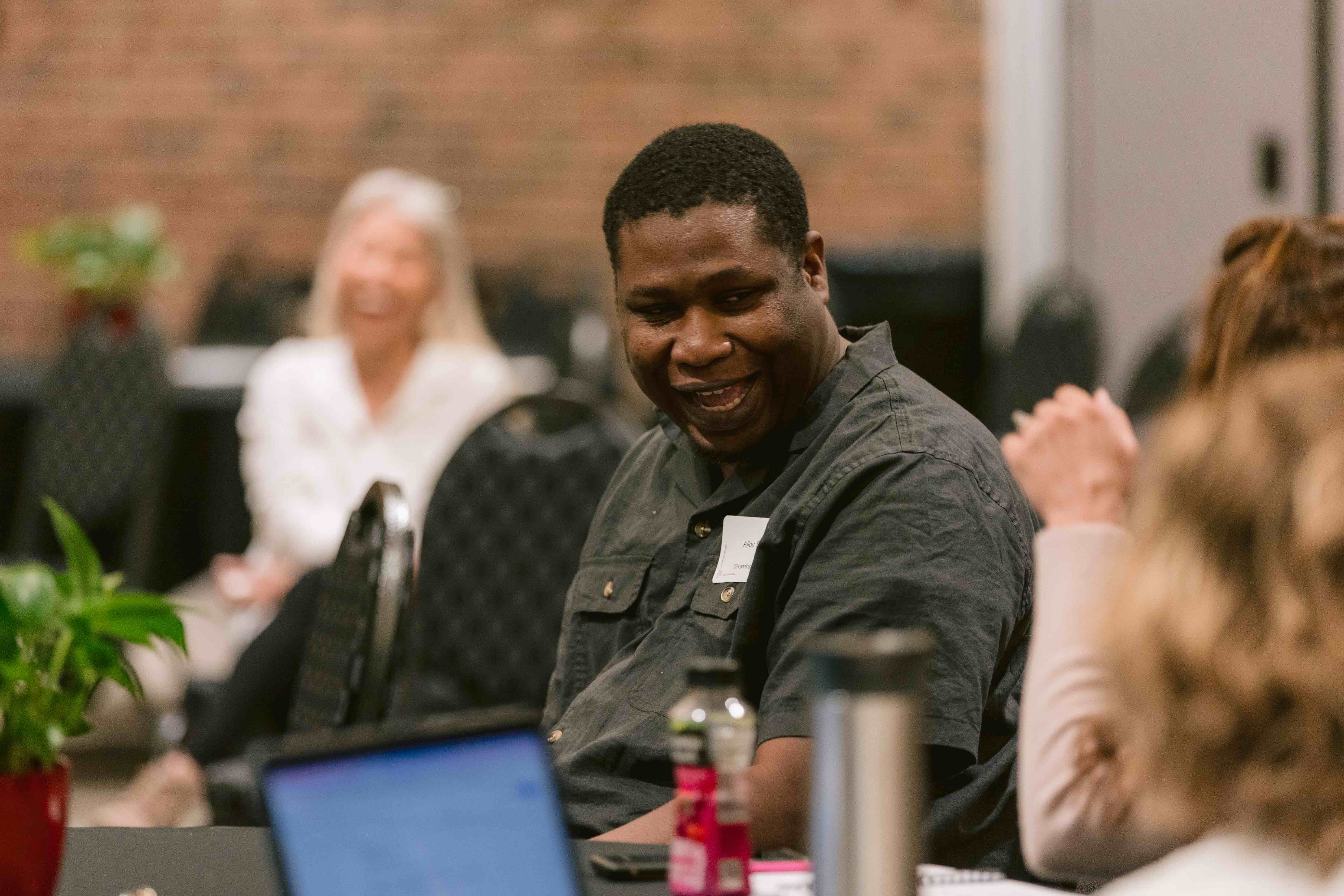 Man sitting at table during a conference