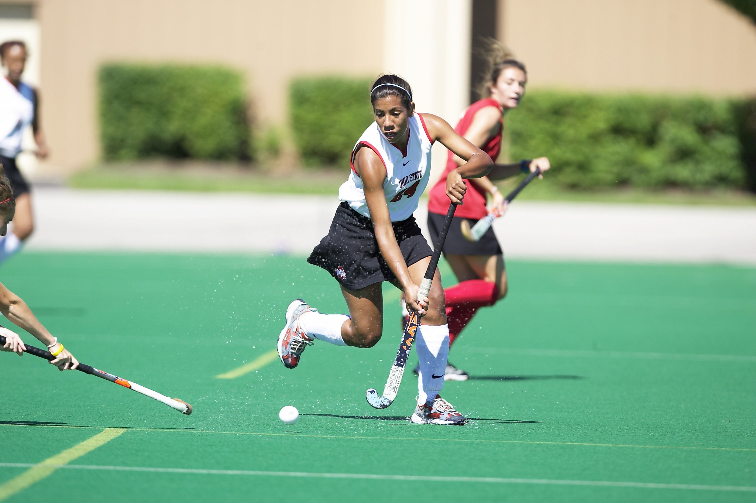 Ohio State field hockey player Yesenia Luces on the field playing Ball State