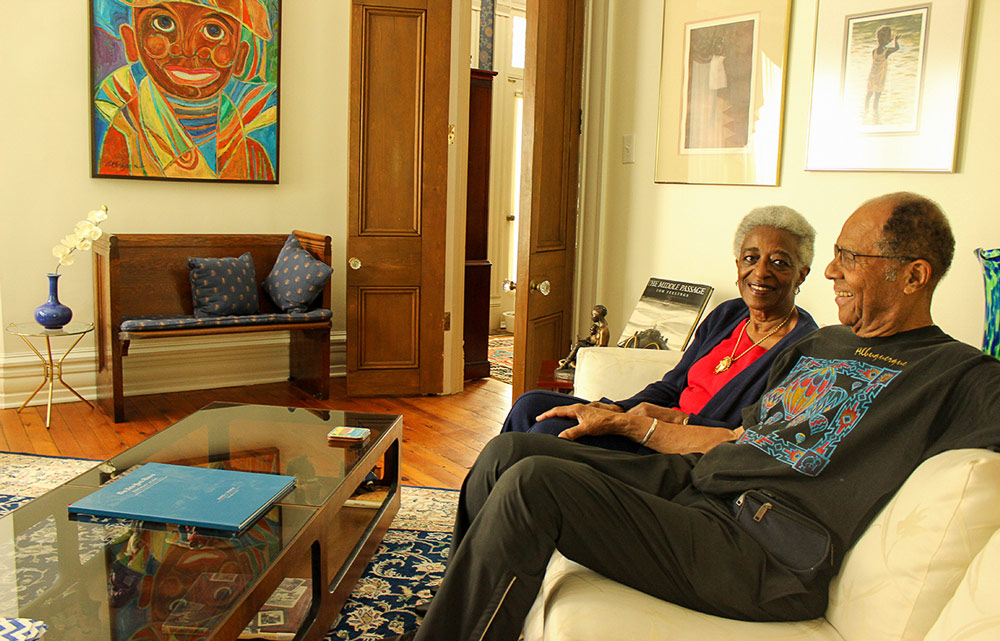 Bishop with her husband, James Bishop, among their art collection in their home.