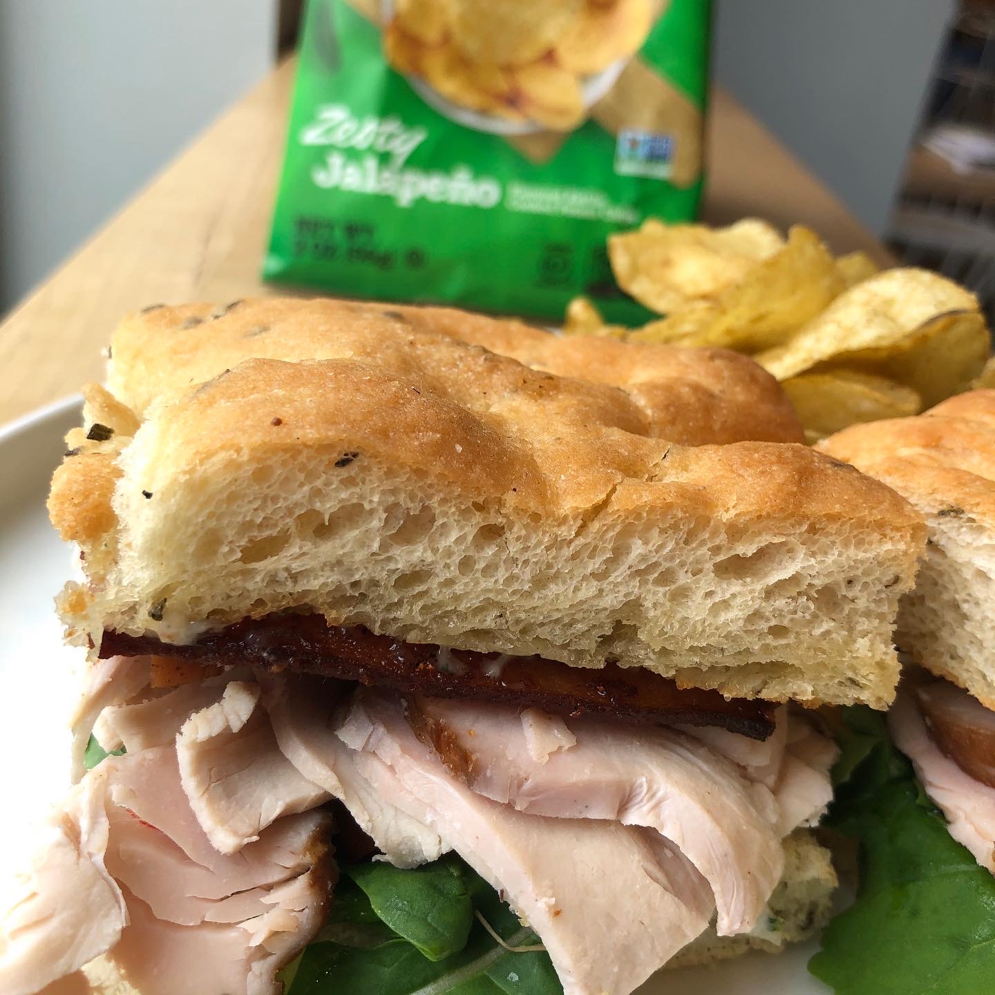Turkey club sandwich and chips